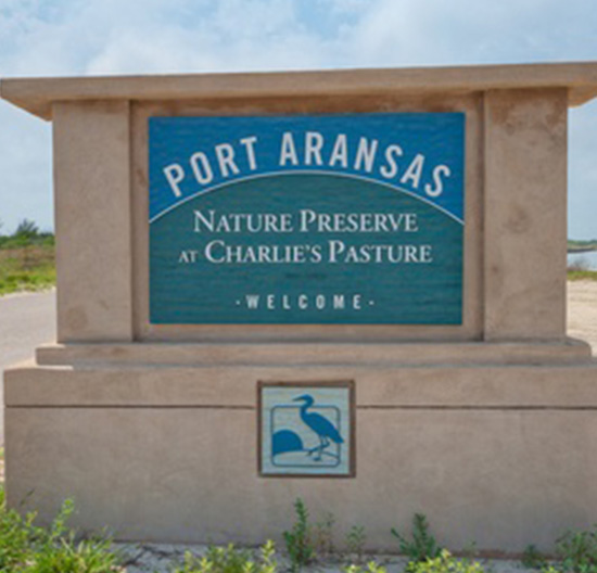 Entrance sign of Port Aransas Nature Preserve at Charlie's Pasture on Mustang Island