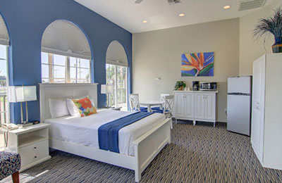 Bright Deluxe Suite with 2 Queen Beds and elegant furnishings at Alister Square Inn