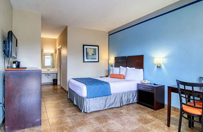 1 Queen Handicap Room at Alister Square Inn with accessible features and modern furnishings