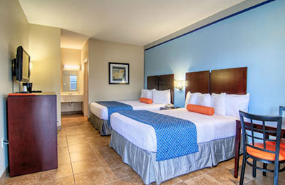 2 Queen Bed Standard Room at Alister Square Inn with a window view and comfortable amenities